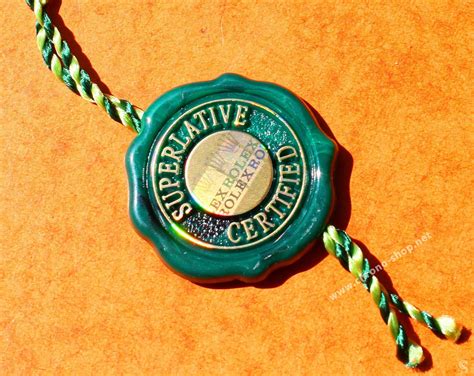 rolex green hang tag seal.